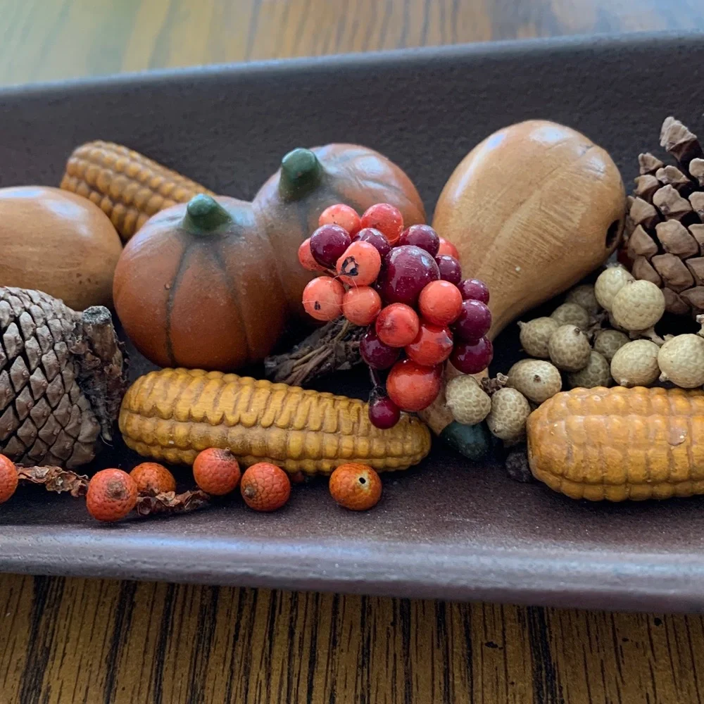 Fall-Themed Decorative Centerpiece in a long shallow bowl.